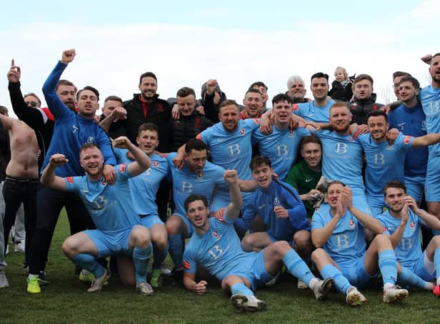 Hastings United celebrate the 2021-22 title - Picture by Scott White