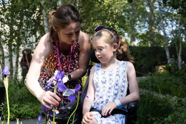 Josie Chubb and her mum Charlotte at the Muscular Dystrophy UK – Forest Bathing Garden