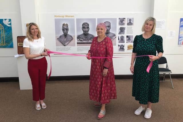 Safe in Sussex Women support worker Samantha Otway, patron Helen Hitchcock and vice chief executive Louise Gisbey cutting the ribbon to open the Kintsugi Women exhibition at Worthing Museum and Art Gallery