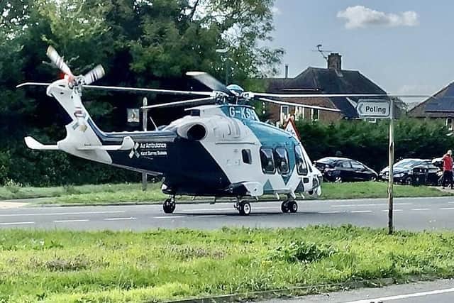 An air ambulance landed nearby after a three-car collision in Poling at around 12 noon on Saturday (October 8).
