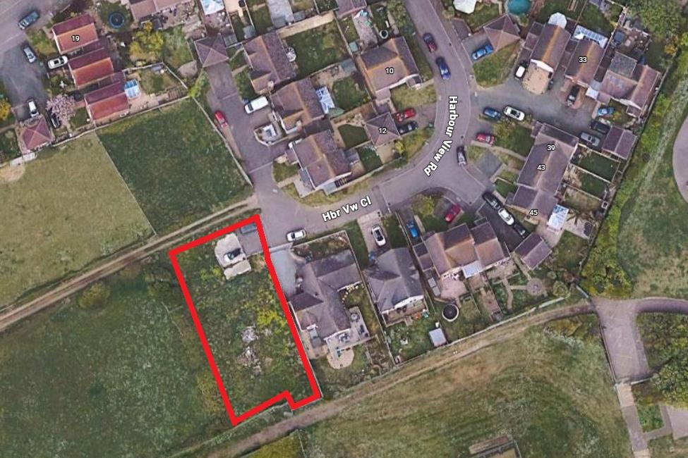 Company applies to build two houses on scrubland in Newhaven in ‘scaled-back’ plan following approval of five homes