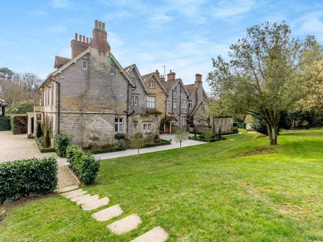The house is set in manicuted gardens and grounds