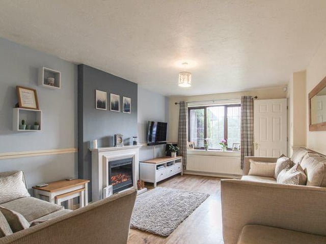 As we step inside the South Normanton property, the first room we find is this spacious living room or lounge. The window overlooks the front of the house.