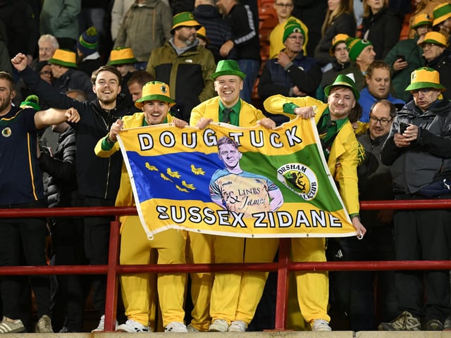Horsham fans celebrating after the Emirates FA Cup First Round match between Barnsley and Horsham at Oakwell Stadium.