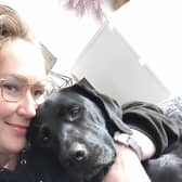 Francesca with her medical assistance dog, Caz