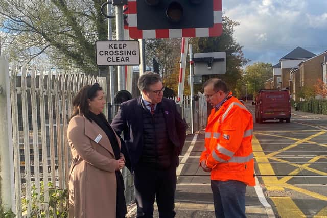 Horsham MP Jeremy Quin meets Network Rail officials at the Parsonage Road level crossing where drivers have branded queues of traffic 'a nightmare'