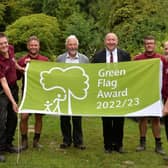 Councillors and parks staff celebrate in Tilgate Park
