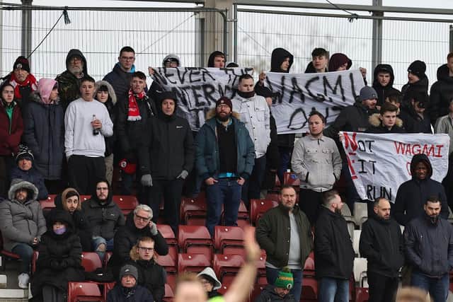 Crawley Town fans protest against they owners of the club at Northampton on Saturday. (Photo by Pete Norton/Getty Images)