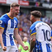 Evan Ferguson celebrates with teammate Alexis Mac Allister after scoring the team's first goal  during the Premier League match between Brighton & Hove Albion and Southampton FC at American Express Community Stadium on May 21, 2023 in Brighton, England. (Photo by Richard Heathcote/Getty Images)