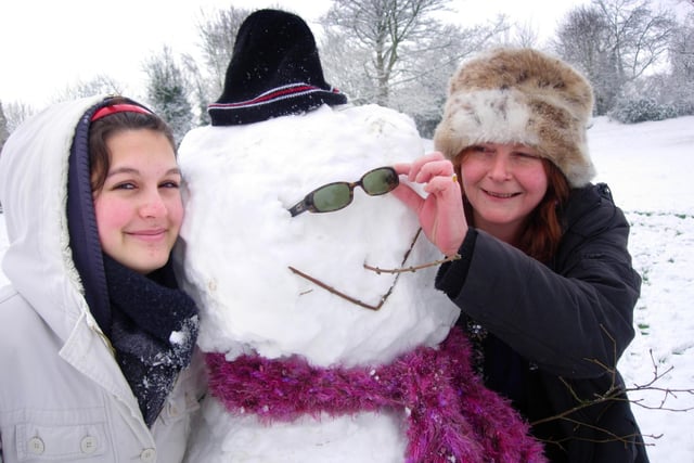 Zara Kirkpatrick and Amby Kirkpatrick with their snowman at Bramber Castle in January 2007