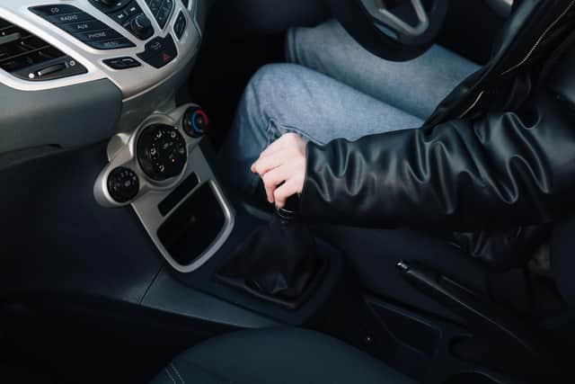 A driver gets to grips with a manual motor.