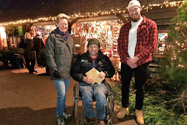 Left to right: Female winner Vicky Reeves from Battle,  Catsfield Christmas Tree Farm owner Clive Collins, and male winner Tadas Zakevicius from Seaford