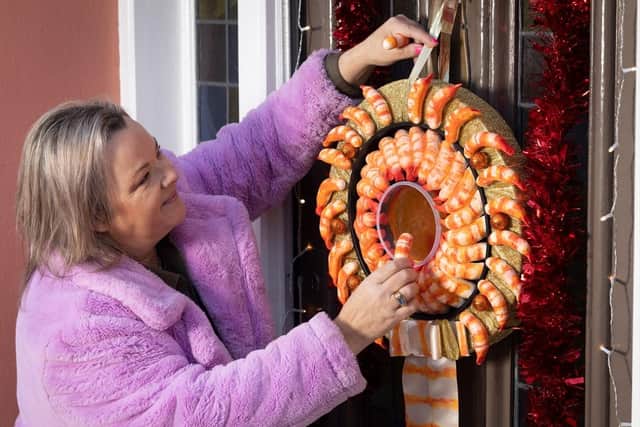Iceland superfan and artist Yvette Driver has created a King Prawn Ring Christmas Wreath to celebrate Christmas, in honour of the ‘iconic’ Iceland Christmas product.