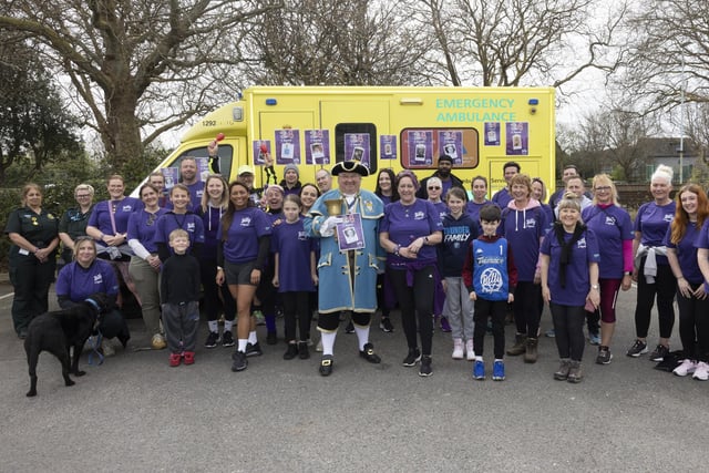 Worthing town crier Bob Smytherman with Billy and Beyond CIC founder Nicci Parish, walkers and paramedics Jenny Mussell and Jess Mills from South East Coast Ambulance Service