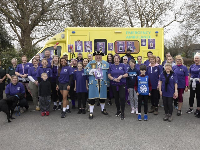 Worthing town crier Bob Smytherman with Billy and Beyond CIC founder Nicci Parish, walkers and paramedics Jenny Mussell and Jess Mills from South East Coast Ambulance Service