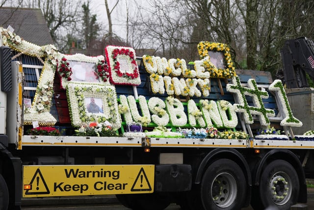 There were large floral tributes to the much-loved dad and grandad.