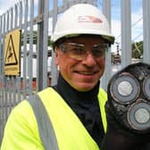 UK Power Networks’ lead field engineer, Peter Dean, on site with a cross section of the new cable.