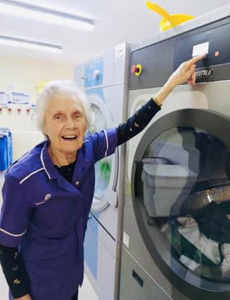 Joan has happy memories of loading her washing machine daily to take care of her family's clothes