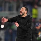 Roberto De Zerbi, Manager of Brighton & Hove Albion, reacts during the UEFA Europa League 2023/24 round of 16 first leg match at AS Roma
