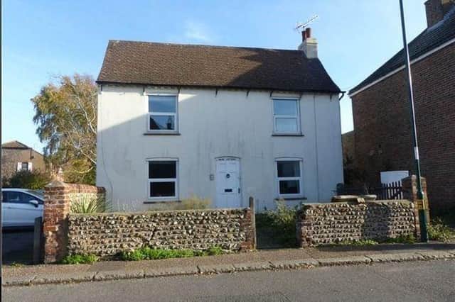 Exterior, the detached property located just minutes away from the town centre.