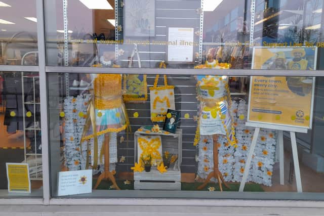 This year's window at the Marie Curie shop in Durrington is particularly vibrant