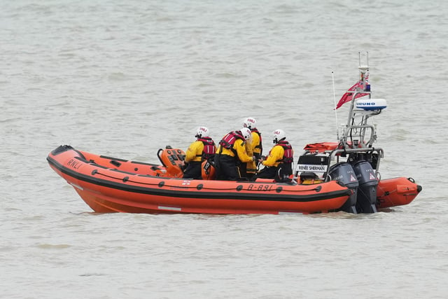 Lifeboat volunteers are assisting at the scene