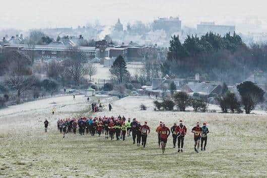 Lewes Downland Santa Fun Run - a memory - a line of Santa Hats on a wintry morning on Lewes Downs