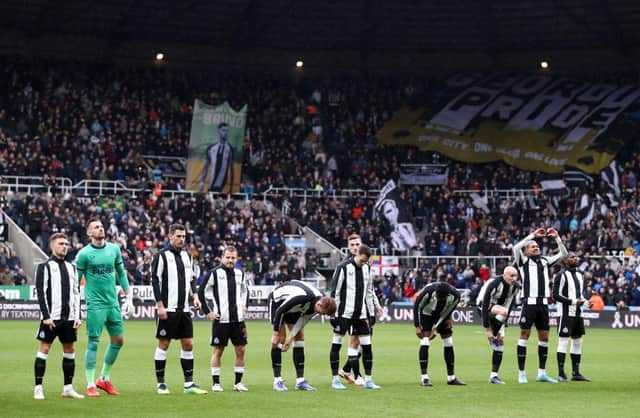 Newcastle United players line up prior to the Premier League match between Newcastle United and Aston Villa at St. James Park (Photo by George Wood/Getty Images)