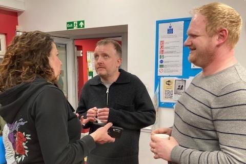 Comedians Chris McCausland and Jon Long with Sight Support Worthing volunteers and members at the charity's centre in Rowlands Road