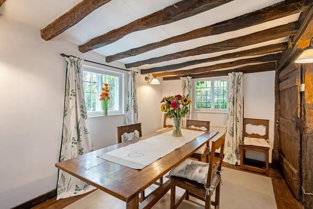 An ample sized breakfast room leads from the kitchen