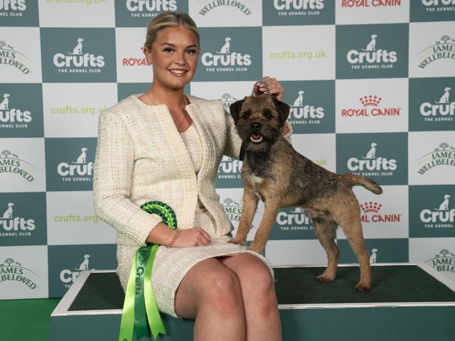 Lauren Goddard, from West Sussex, with Winston, a Border Terrier which was the Best of Breed winner on Day 1 (Thursday, March 6).