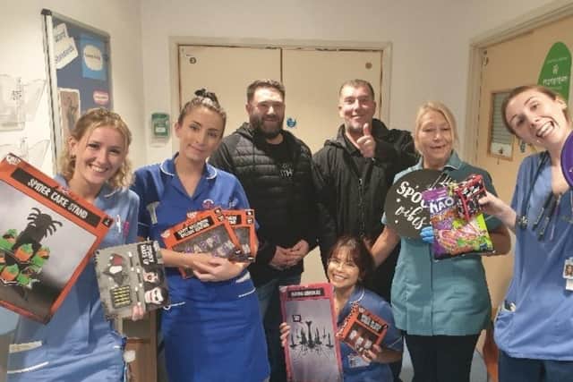 A Worthing community group has raised thousands of pounds for staff to buy Christmas presents for children in their care.