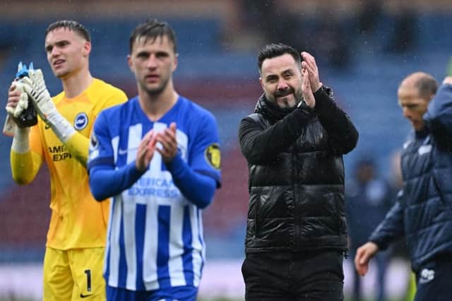 Roberto De Zerbi, Manager of Brighton & Hove Albion, applauds the fans.
