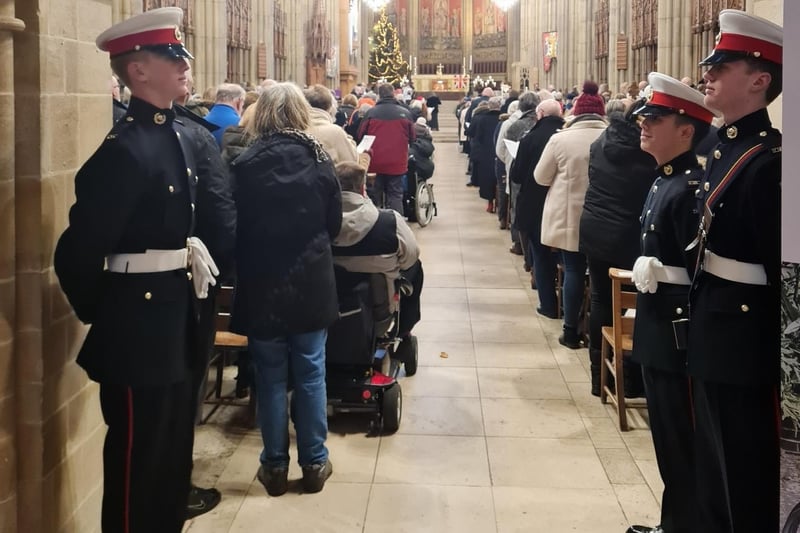 TS Vanguard cadets form a guard of honour to welcome guests to the annual Christmas carol concert at Lancing College Chapel