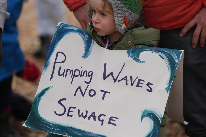 Campaigners put on costumers and held up banners in protest against sewage discharges in the Adur district.