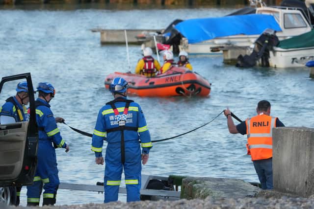 A Coastguard Recue Team and RNLI lifeboat volunteers from Littlehampton off the coast at Goring after the jet ski accident on Monday night