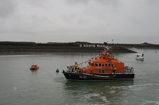Residents brave the rain to welcome Eastbourne RNLI's new lifeboat