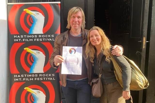 Mark Forbes with his award at the Hastings Rocks International Film Festival