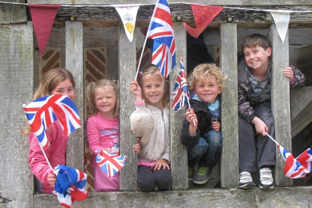 Ella O’Keefe, Poppy King, Milly King, Rueben King and Jesse King wait to catch a glimpse of the Earl and Countess of Wessex at the Weald and Downland Museum