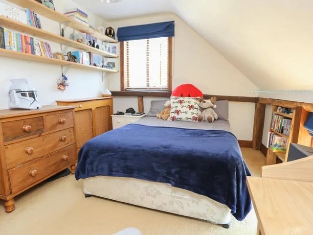 This five bed converted barn in Anmore Road, Denmead is on the market for £1.4m. It is listed on Zoopla by White & Guard Estate Agents.
