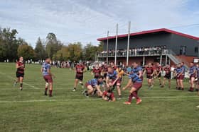 Ollie Simpson scoring his fourth try in the last play of the game