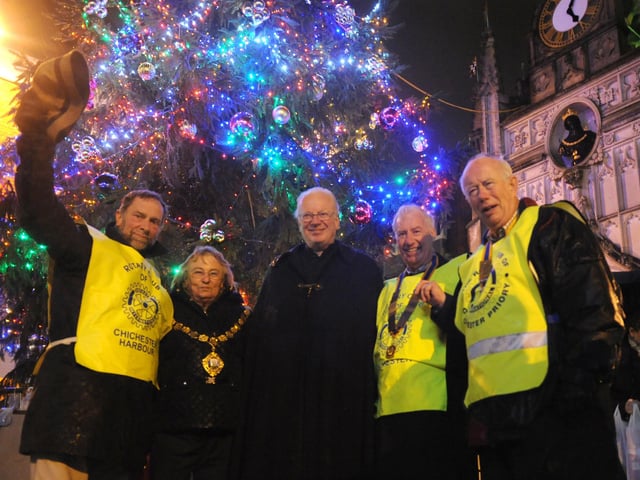 Blessing the tree in 2012, the Dean of Chichester Dr Nicholas Frayling alongside mayor Anne Scicluna and Rotarians David Hilditch, Richard Hancock and Chris Doman