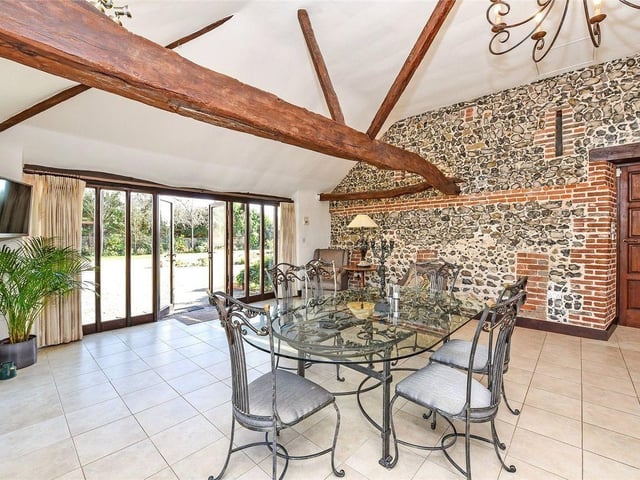 High, vaunted ceilings and lots of windows give the property a unique sense of space.