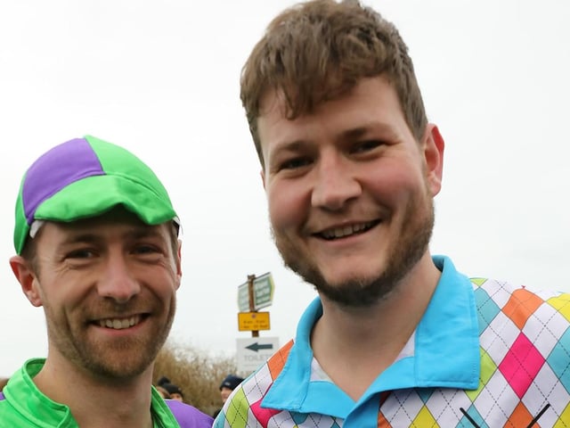 Some 385 people braved the ice cold sea water on New Year's Day 2024. Domas Hamilton (left) and Josh Williams