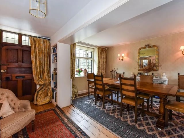 On one side of the hall is a good-sized formal dining room