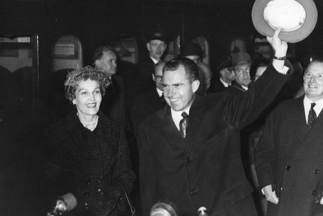 American Vice President Richard Nixon greets the crowds on arrival at Gatwick airport. His wife Pat is beside him.    (Photo by Fox Photos/Getty Images)