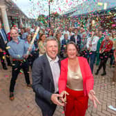 The opening of Wellbeing Square in Newhaven on Thursday, September 3. Leader of Lewes District Council Zoe Nicholson (front right), with Lewes MP James MacCleary (front left) and Duncan Kerr (far left, second row) Photo: Cripps Photography, via LDC.