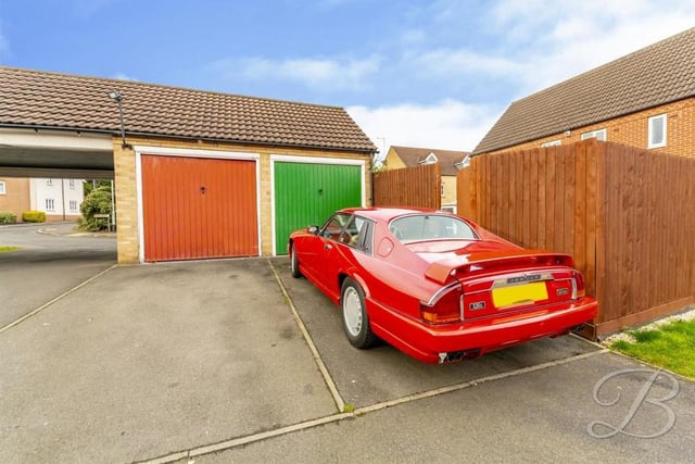 Belonging to the property is this handy garage. Off-street parking is also provided by the driveway at the front.