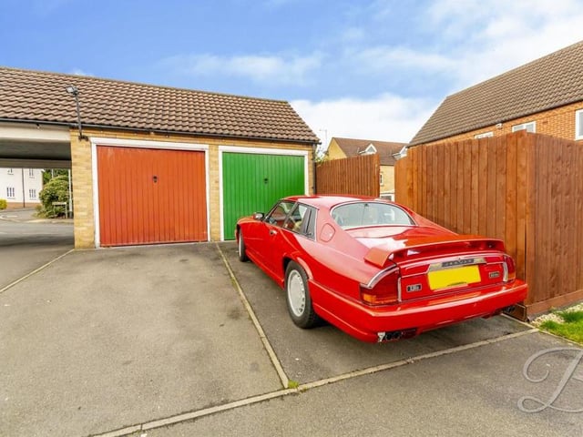 Belonging to the property is this handy garage. Off-street parking is also provided by the driveway at the front.