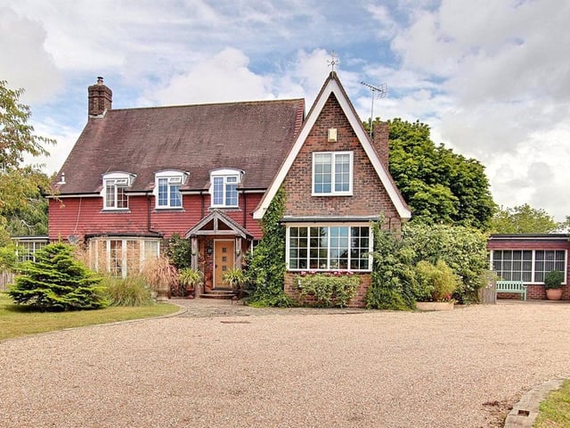 This four-bed detached house in Orchard Lane, Lyminster, features spacious accommodation throughout, with spacious living room, a feature kitchen/dining space, snug, study, beautiful surrounding gardens and a one-bed self-contained annex. It is on the market for £1.4million.